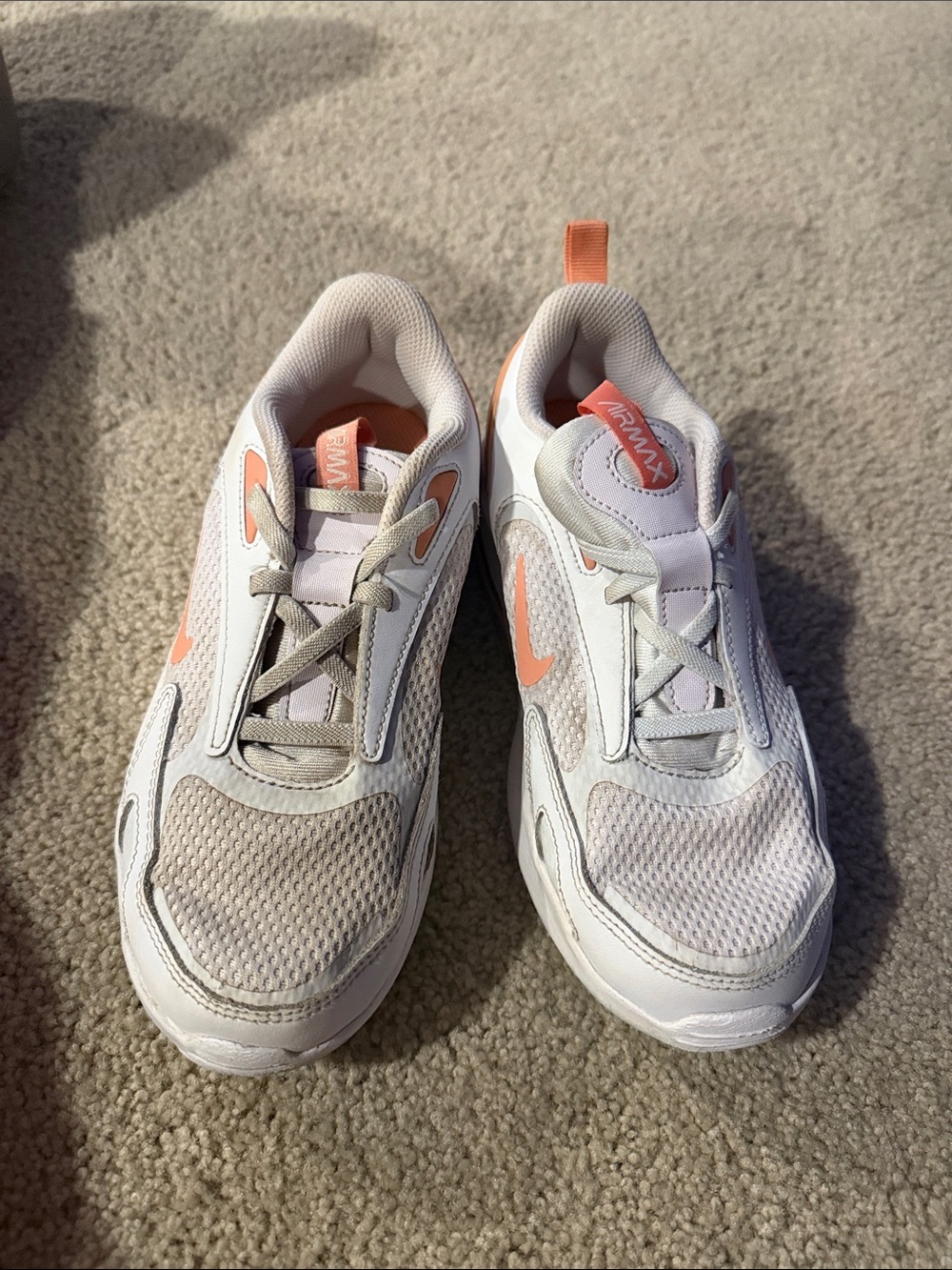 Nike Kids White Sneakers with Coral Accents